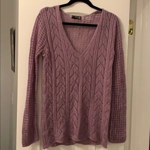 Large acrylic purple sweater.